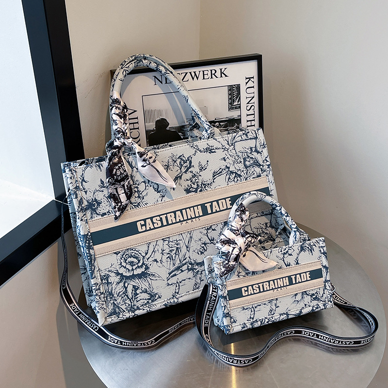 Bolsos de lona transfronterizos bolsos de mujer 2025 nueva moda retro letras impresas bolsos de hombro de gran capacidad