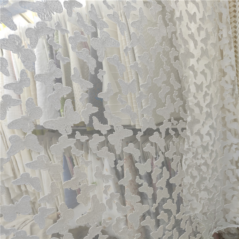 针织蝴蝶剪花提花面料 蝴蝶透明剪花 春夏连衣裙童装布料批发