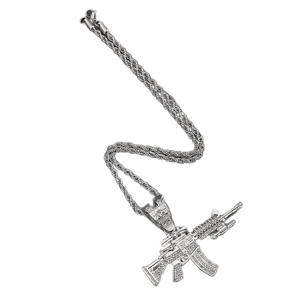 TEMU ventas calientes de nuevo diamante tipo arma de joyería aleación de simulación AK modelo de armas cross-border hip hop collar de hombre