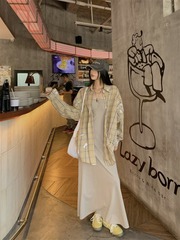 純欲風白色減齢花蕾ベストスカート新型海辺リゾート風仙気雰囲気感重ね着ワンピース女性
