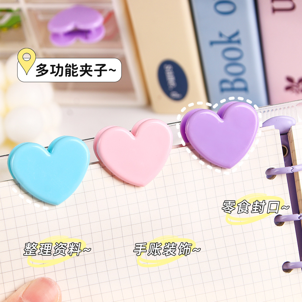 Clip de plástico de amor creativo de color en el corazón de una chica de viento fotos de almacenamiento de decoración de carpetas de oficina de estudio