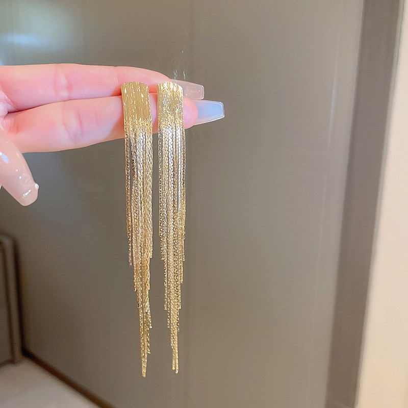 Pendientes de borla de hoja de circón largo de viento de metal con aguja de plata Pendientes de moda exquisita Pendientes de lujo ligero de viento frío