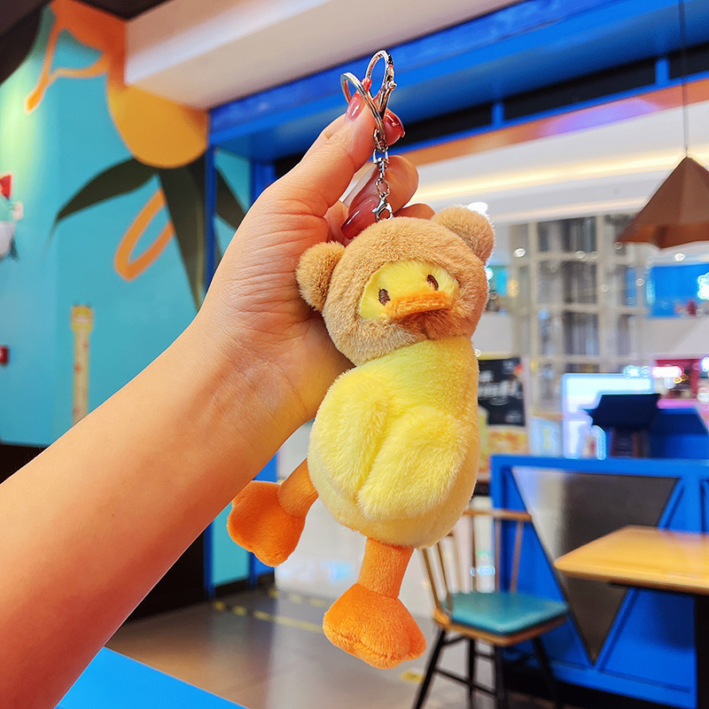 ぬいぐるみのかわいいアクセサリーのぬいぐるみのペンダント卸売りのおもちゃの子供のかばんの漫画の子供の鍵は子供の機械をつかみます。
