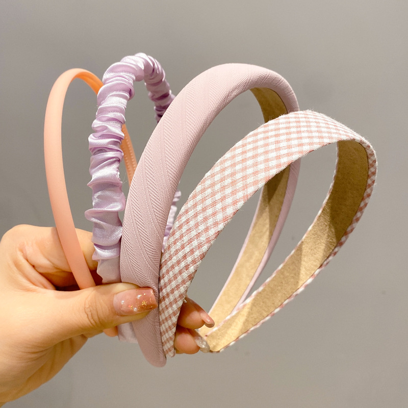 A principios de la primavera, la banda de cabello para mujeres en línea, 2025 nuevo lavado de cara de presión de tarjeta de cabello para el cabello, banda de cabello de perlas, banda de cabello para mujeres.