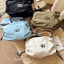 韩国小众潮牌EM尼龙抽绳帆布包运动休闲单肩斜挎防水大容量轻便