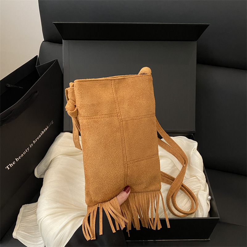 2025 New Suede Niche Design New Women's Bag Bohemian American Tassel Bag Frosted Crossbody Hand