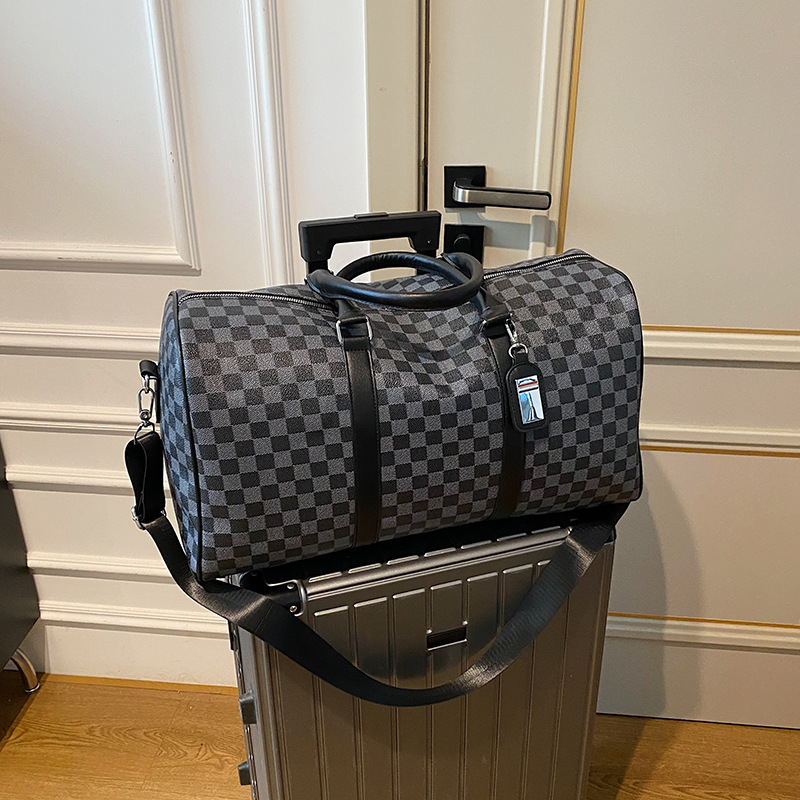 Bolsa de viaje nuevo Tablero de tela escocesa bolsa de viaje de gran capacidad bolsa de almacenamiento bolsa de equipaje bolso crossbody impermeable al por mayor