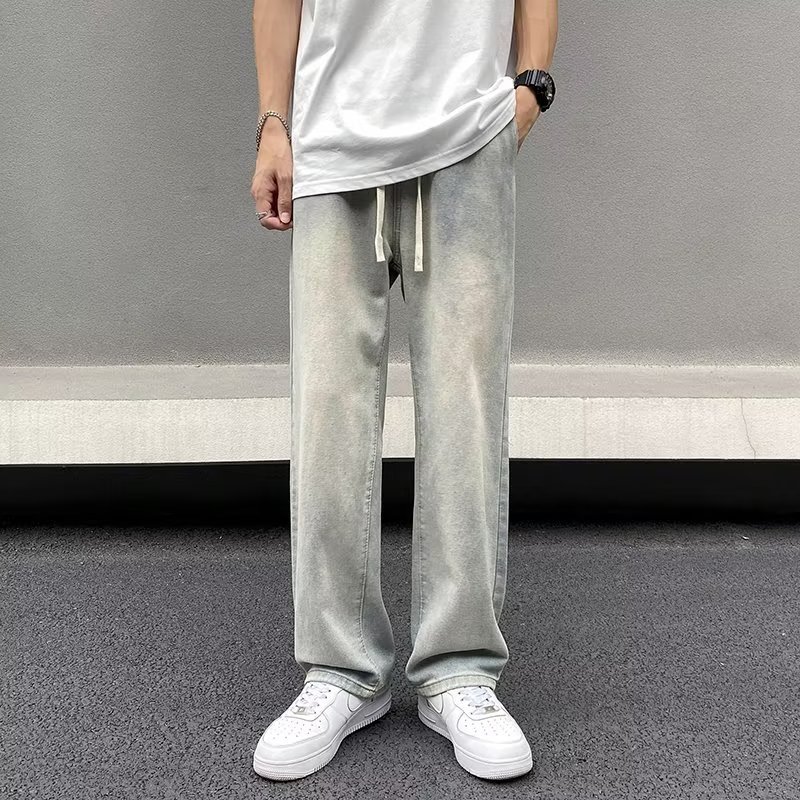 Vaqueros americanos, pantalones teñidos de barro amarillo de seda de hielo viejos lavados de verano para hombres, pantalones rectos sueltos de la marca de moda de la calle principal