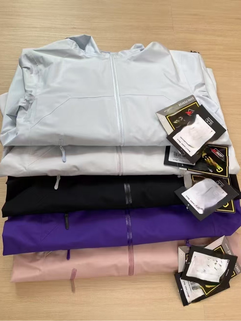 Pájaro con la chaqueta beta pareja con el mismo viento a prueba de agua delgado plástico LOGO de cáscara dura