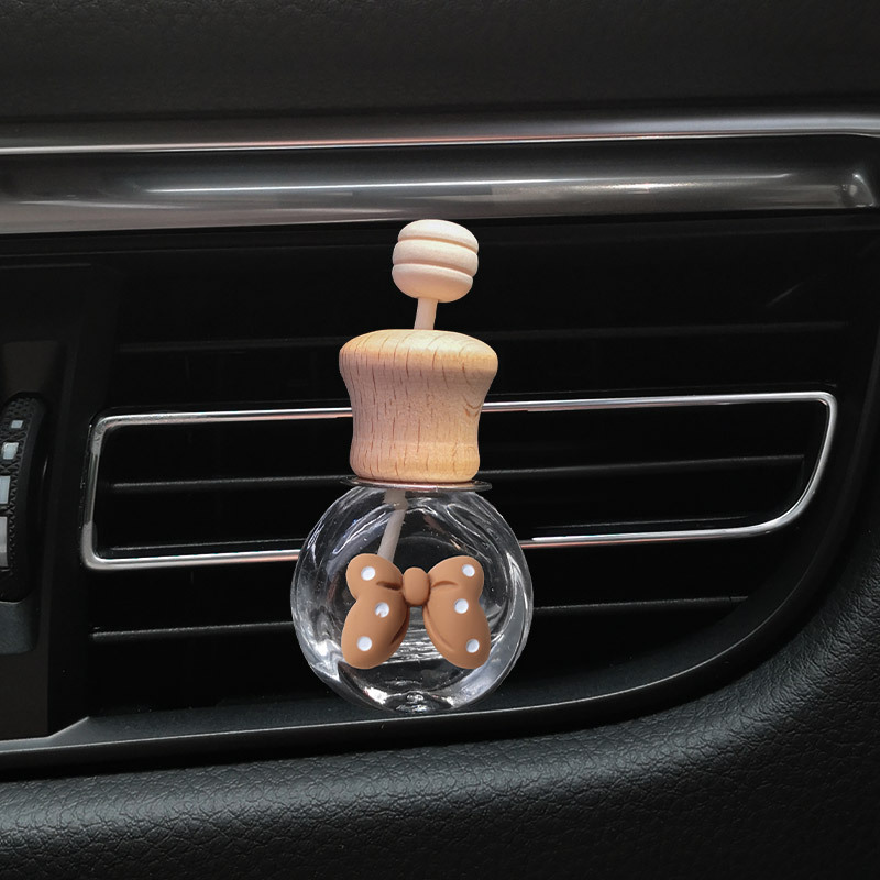 Red de la red color té leche dibujos animados coche salida de aire botella de perfume creativo lindo coche decoración de aromaterapia accesorios de coche