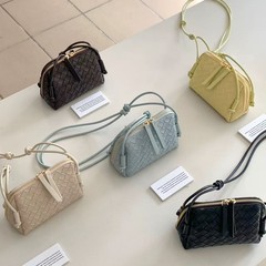 新商品のケースは気質の斜めショルダーバッグの女性が女性のカバンを編んでいます。