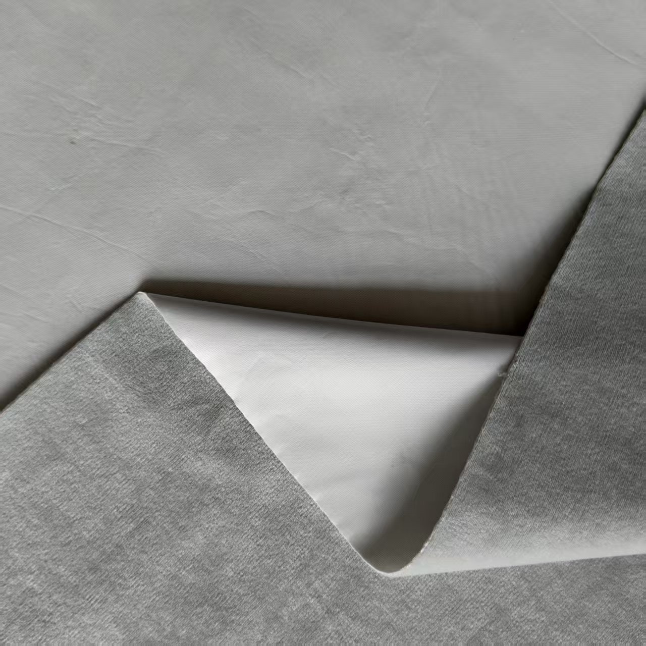 现货超柔复合PU充气玩偶面料水晶超柔复合PU防水狗窝猫窝毛绒面料