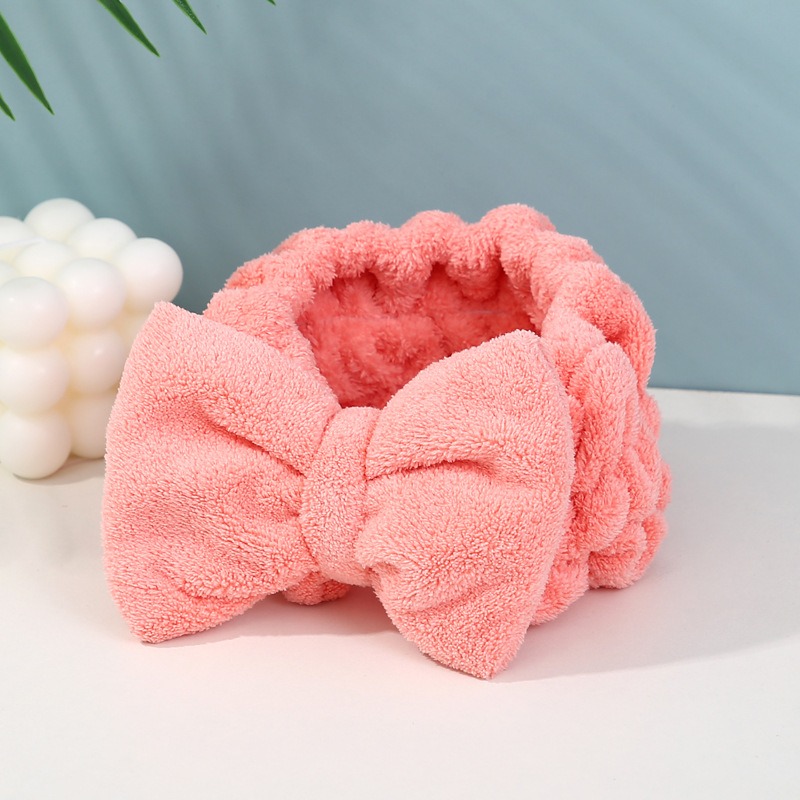 Розовая повязка на голову