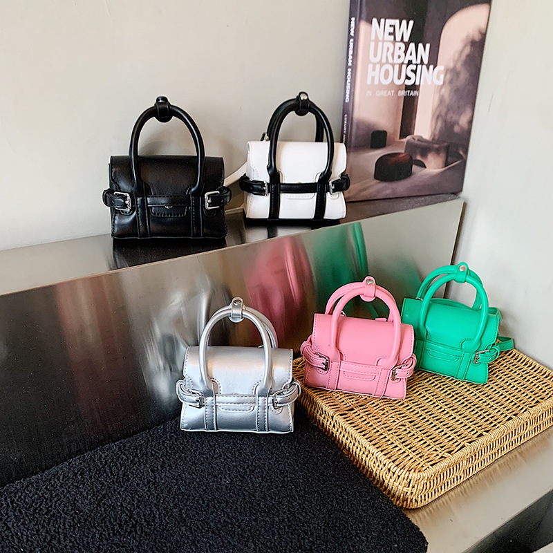 Coreano simple color sólido bolso de hombro para niños y niñas pequeño mini bebé portátil bolso de mochila nuevo accesorios para niños