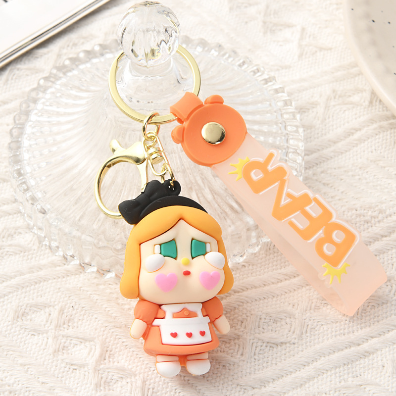 Muñeca de dibujos animados goteo llavero bolsas escolares exquisitas para hombres y mujeres colgantes para agarrar muñecas colgantes para el mercado nocturno regalos al por mayor