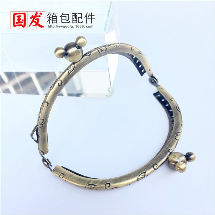 Sin stock: 8.5CM semicircular flor de dragón y phoenix estereoscópico Mickey cabeza oro bronce bolsas hebilla bolsas clip