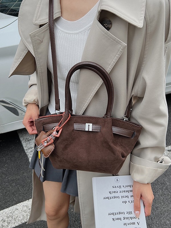 Cestas de platos de mano bolsas de cubo mujeres 2025 nuevo cross-border europeo y americano retro mochila de piel de ciervo esmaltado