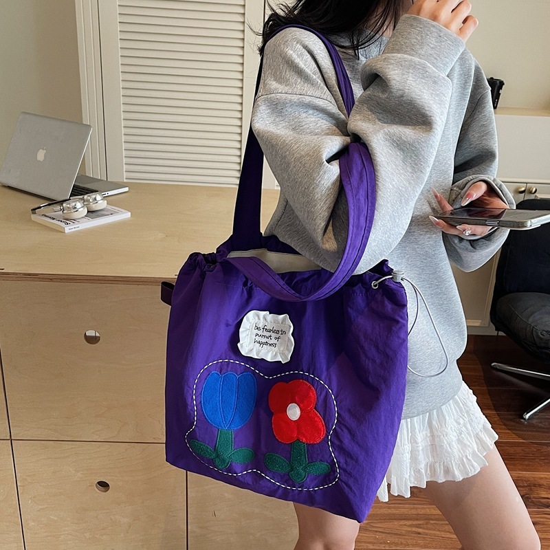2025 夏の新スタイルナイロン刺繍巾着トートバッグ女性の韓国スタイルリラックスニッチ大容量ショルダーバッグ|undefined