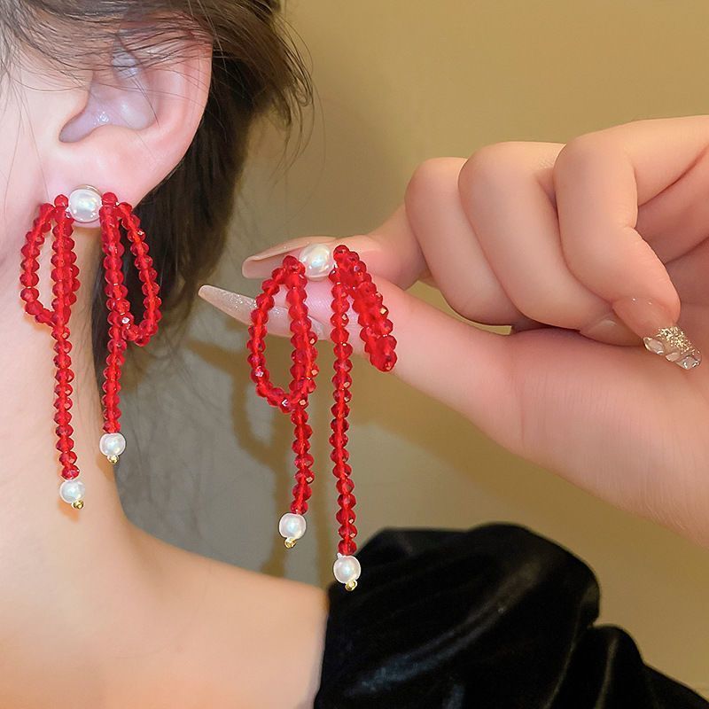 Pendientes de amor con goteo de aceite rojo con aguja de plata, botones de oreja de temperamento de moda de nicho, pendientes simples y de alta gama de estilo de Hong Kong