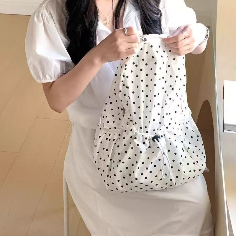 新款双肩包ins轻便文艺波点背包女生校园风抽绳褶皱休闲日系书包|undefined