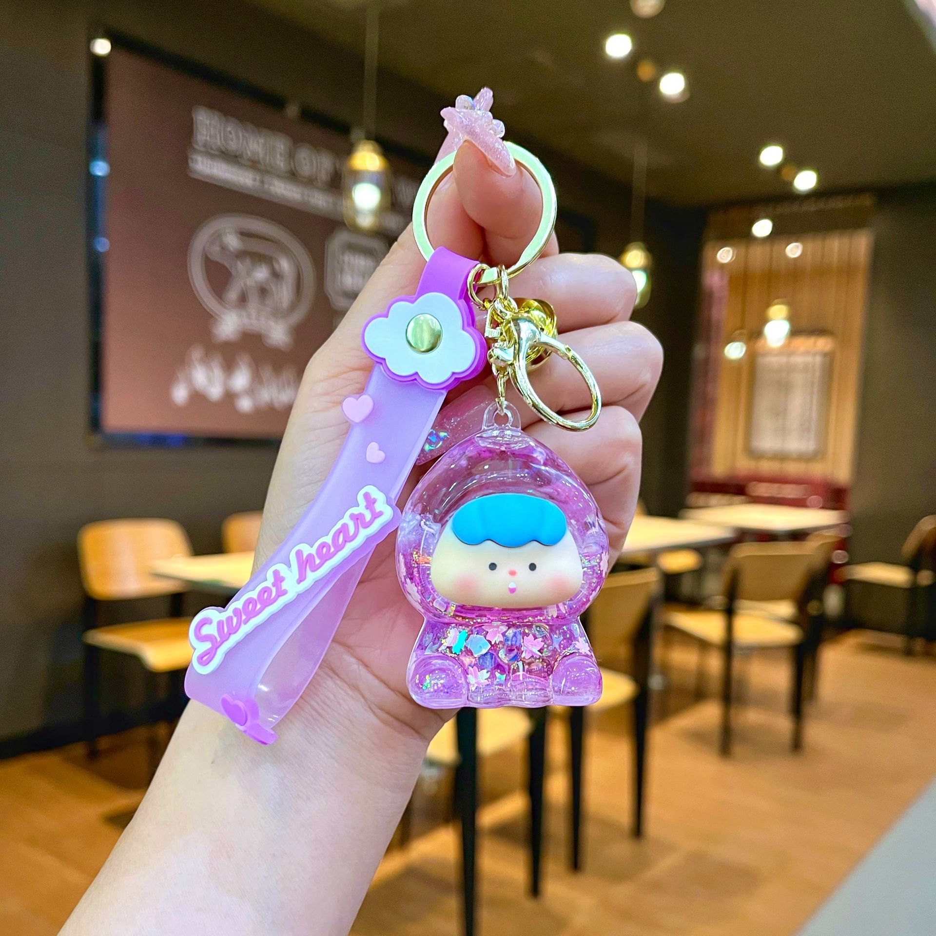 Nuevo llavero de dados luminosos con aceite, cuentas de burbujas, dados, colgantes de botella de arena de cristal, colgantes de bolsas al por mayor