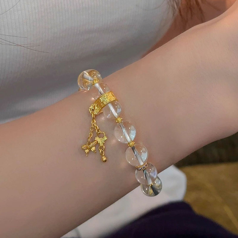Xiaohongshu 人気のホワイトウォータービーズブレスレットゴールデンタッセルアクセサリー絶妙なハイエンドブレスレットファッションモデルドロップシッピング|undefined