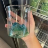 Green big shot of the mountain cup