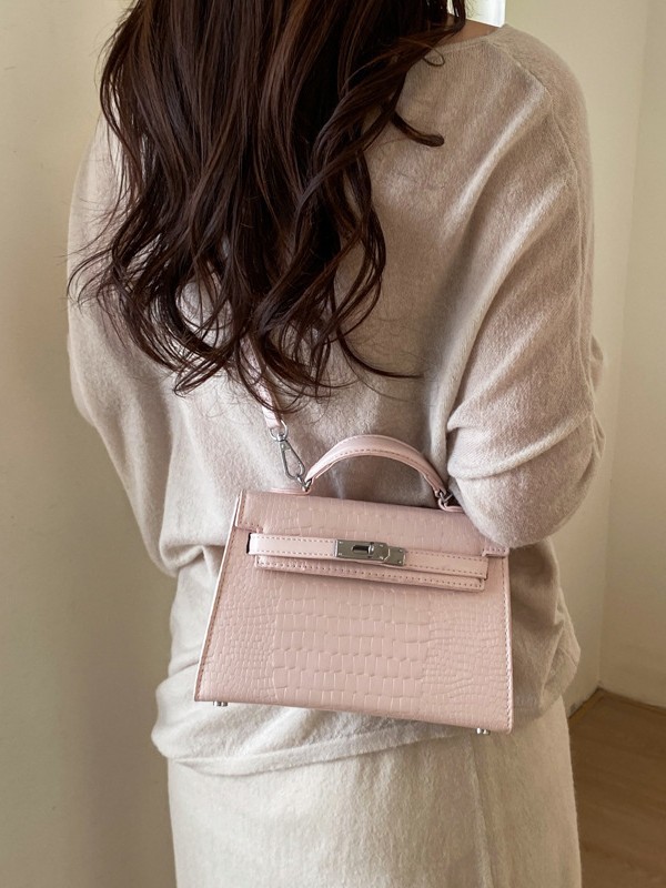 Nicho popular cocodrilo portátil bolso Kelly mujer 2026 nueva moda versátil alta sensación de hombro mochila