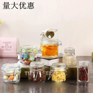 Factory supply stainless steel buckle glass sealed jar transparent grains storage jar round moisture-proof tea storage bottle
