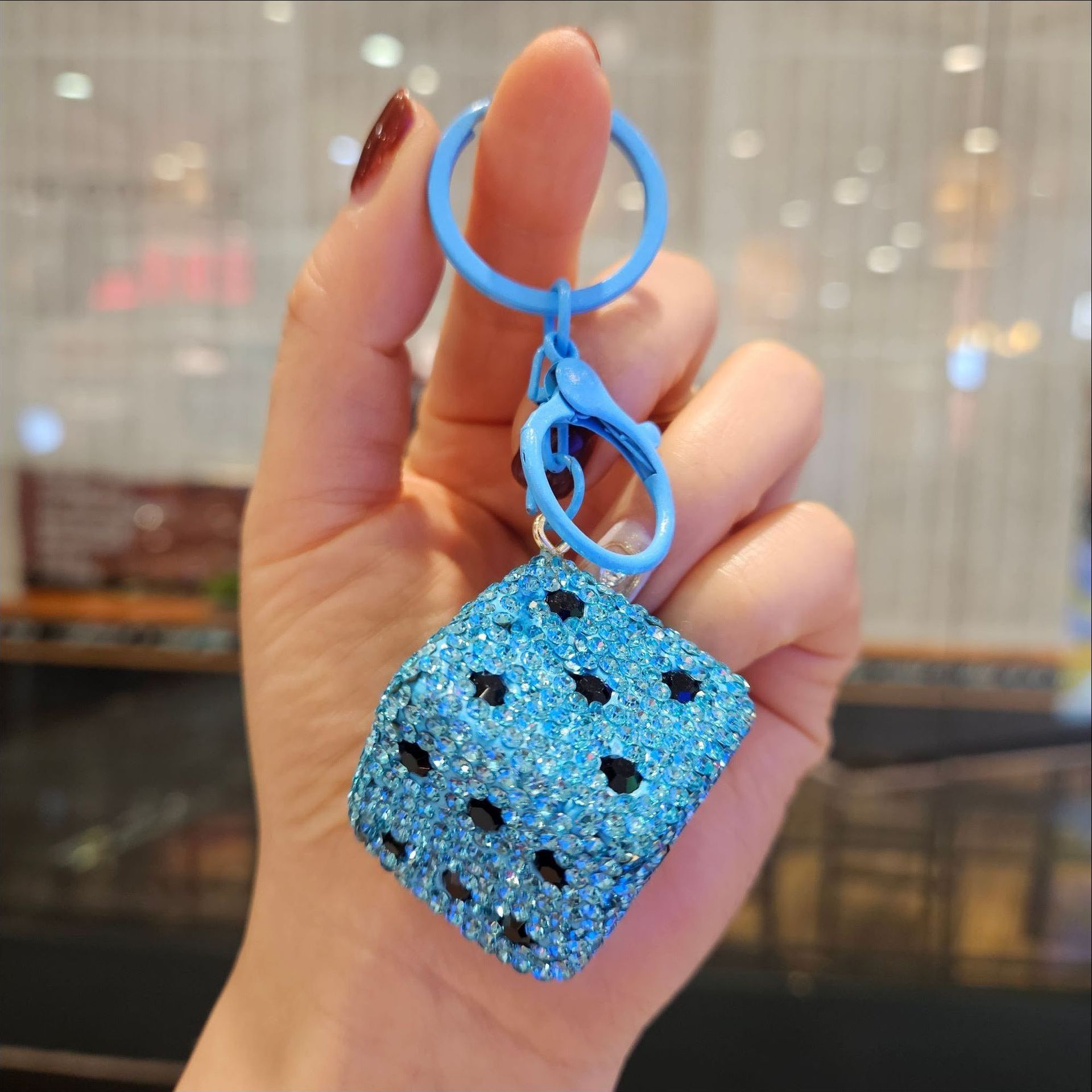 Diamond-encrusted dice—blue
