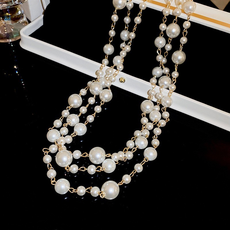 Collar con cuentas de perlas de gota de agua con diamantes transfronterizos otoño e invierno cadena de suéter de lujo ligero francés moda todo fósforo joyería de alta gama