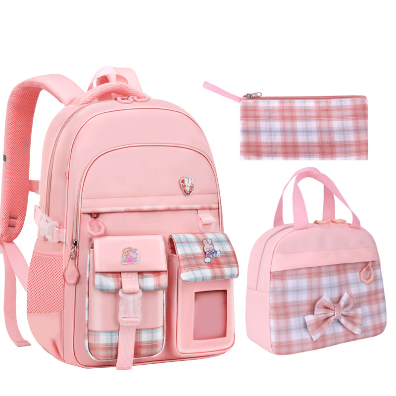 Nueva mochila Niñas estudiantes de escuela primaria cuatro o cinco niñas de tres a seis reducción de Carga Protección de la columna vertebral niñas de primer grado Super Light Niños