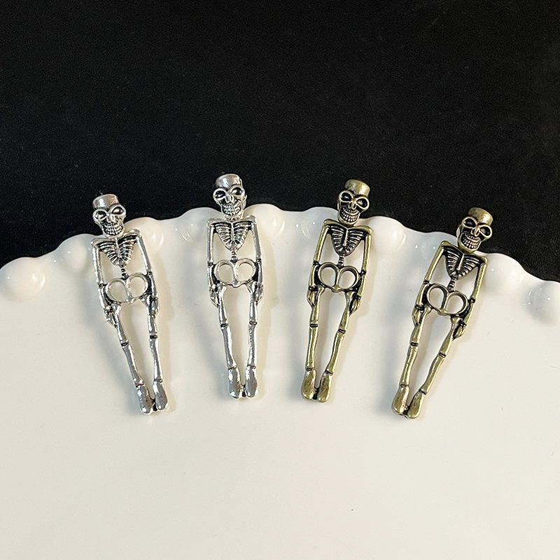 S925 silver needle European and American Halloween skull earrings female exaggerated dark light luxury advanced design ear studs earrings