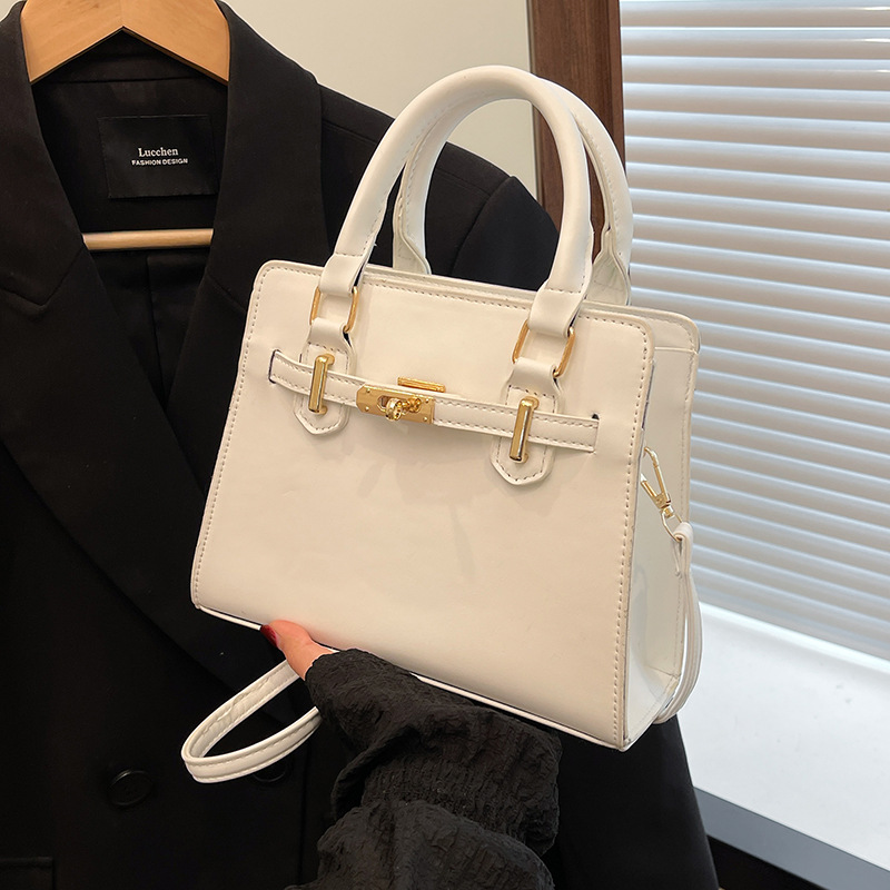 Bolso Kelly portátil retro simple para mujer 2025 primavera y verano nuevo bolso de hombro de moda bolso de mensajero de viaje de moda