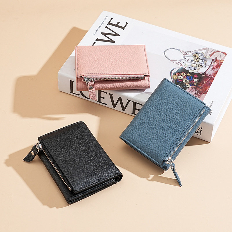 三つ折り財布の女性のトップ層牛革RFID盗難防止ブラシクリップ多カード位真皮カードバッグジッパー小銭袋