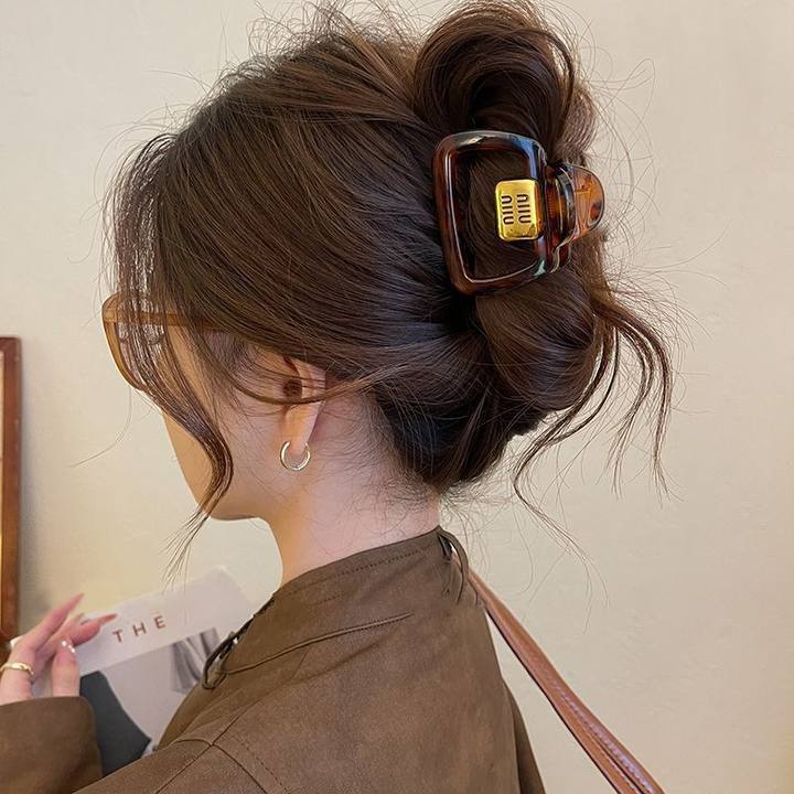 Niu logo black tea leopard print bag about 5.5cm