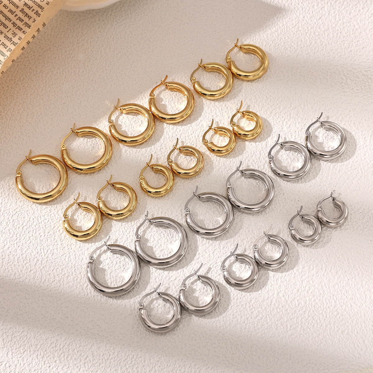 Taina europa y americana pendientes de acero inoxidable nicho de alta calidad estilo anillo personalidad oro y plata de doble color joyas de acero de titanio