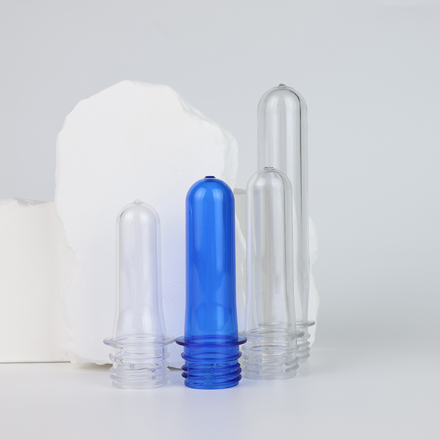 Proveedores al por mayor 28mm / 1810 botellas en blanco de grado alimenticio PET botellas en blanco de bebidas minerales botellas en blanco de nuevo material de producción