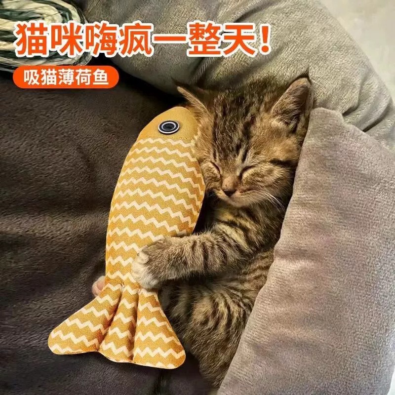 新商品の猫のおもちゃの麻のミントのぬいぐるみのシミュレーション魚は枕を抱いて猫の棒をからかうことに耐えます。|undefined