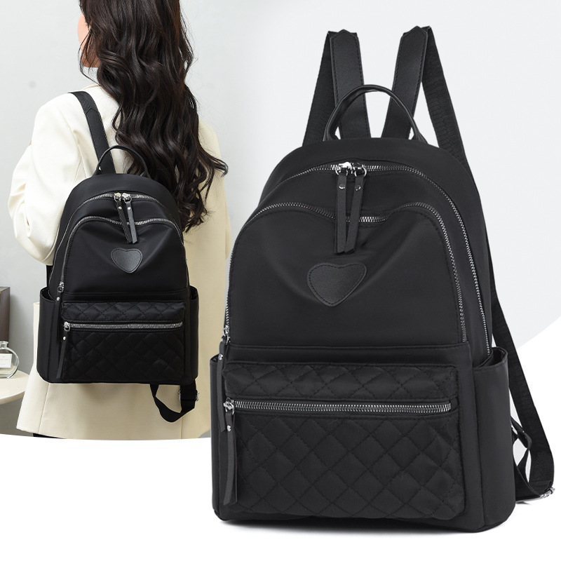 Venta al por mayor transfronteriza 2023 primavera nueva mochila Oxford casual para mujer simple y versátil mochila ligera al aire libre marea