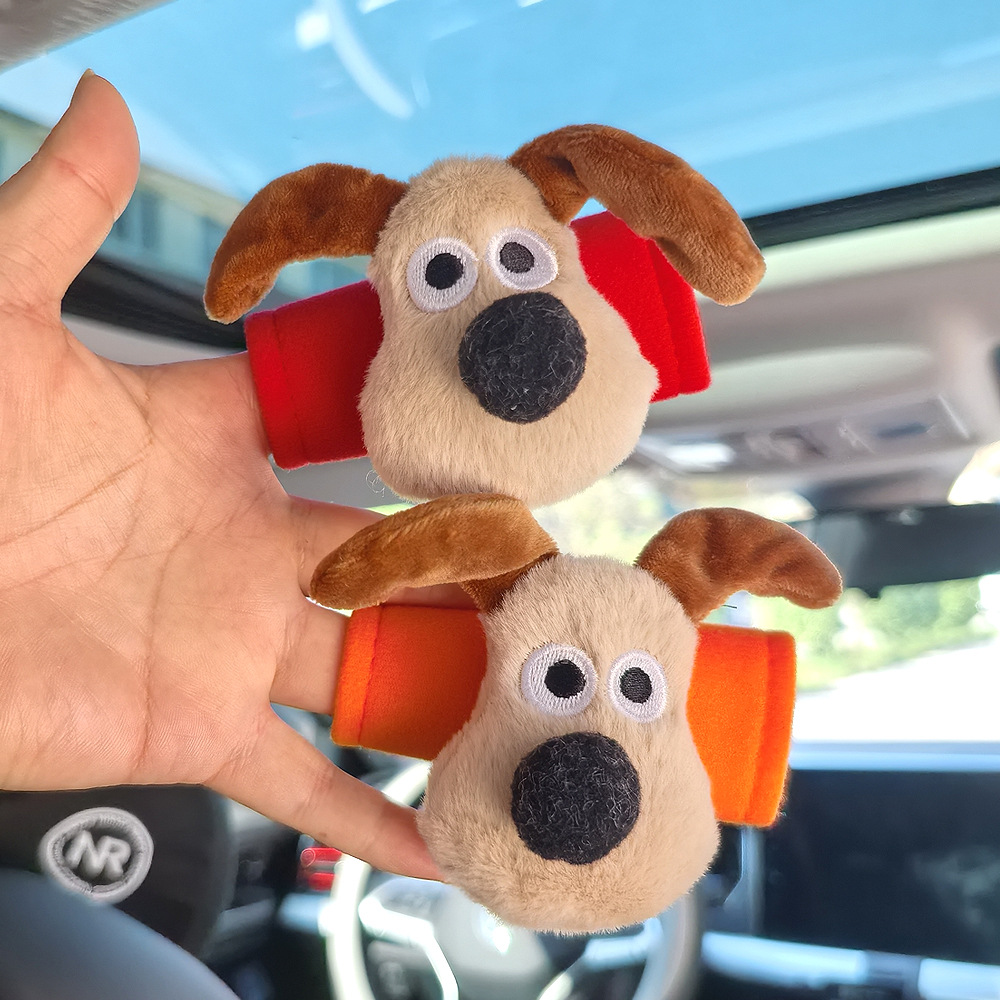 Perro de peluche maneja de automóvil maneja de automóvil masculino y femenino maneja de puerta interior cubierta guante de techo