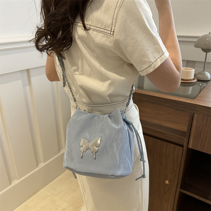 2024 nuevo estilo de moda coreano de este año popular bolso de cadena nicho de diseño de mariposa bolso de cubo