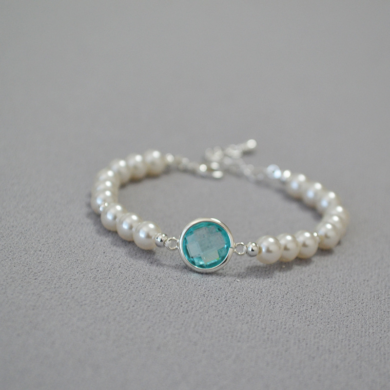 Japanese and Korean niche fresh artistic sea blue carved crystal glass bright round pearl simple temperament bracelet for women