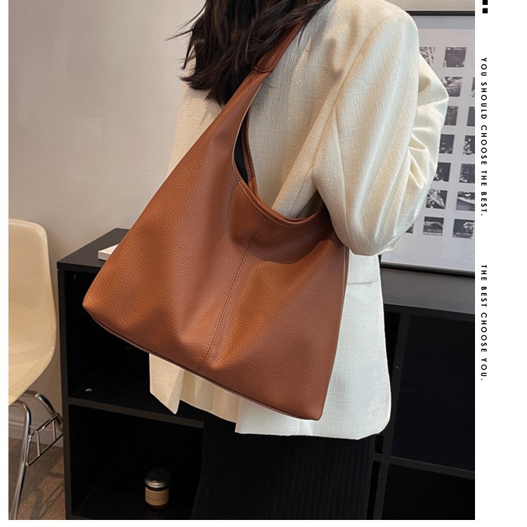 Bolsos de gran capacidad para mujeres primavera y verano 2025 nuevos bolsos de hombro de moda de alta calidad cubos de agua para niños y madres bolsa especial de cercanías