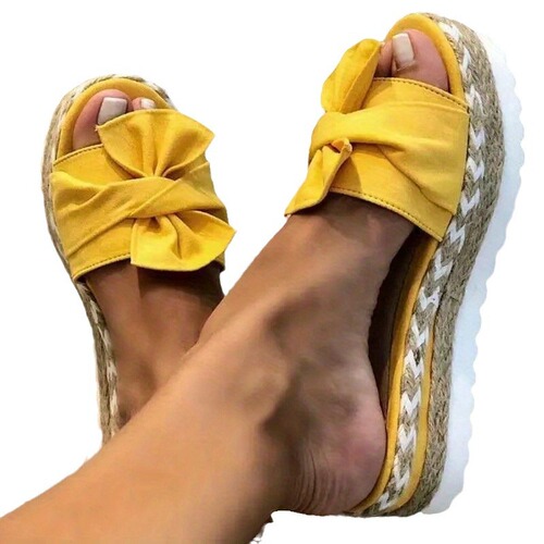 European and American-style summer wedge sandals with bow for women, featuring a thick-soled jute design—available in large sizes for beach wear.