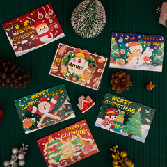 新しいアイデアのクリスマスの漫画の箔押しのグリーティングカードのクリスマスの祝福の贈り物の祝日は人に小さいカードのはがきを送ります。