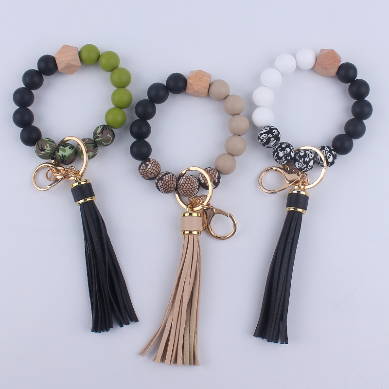 Nuevo cuero de la PU de la borla llavero DIY de silicona estampado de leopardo con cuentas muñeca llavero colgante Accesorios