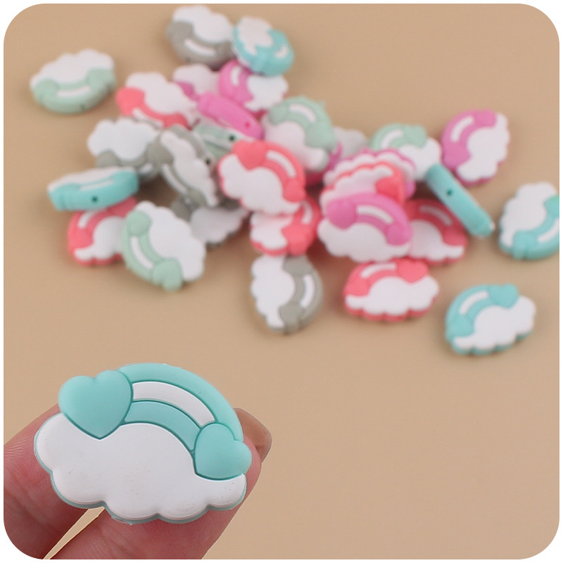 Nuevo bebé suministros de dibujos animados nube Arco Iris mordedor creativo bebé molar pezón cadena anti-caída cadena Accesorios