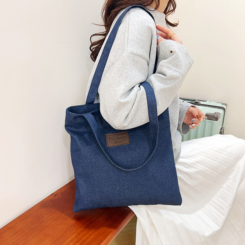 Bolso de lona de mezclilla retro ins bolso de hombro de gran capacidad para estudiantes que viajan a clase bolso de todo fósforo primavera