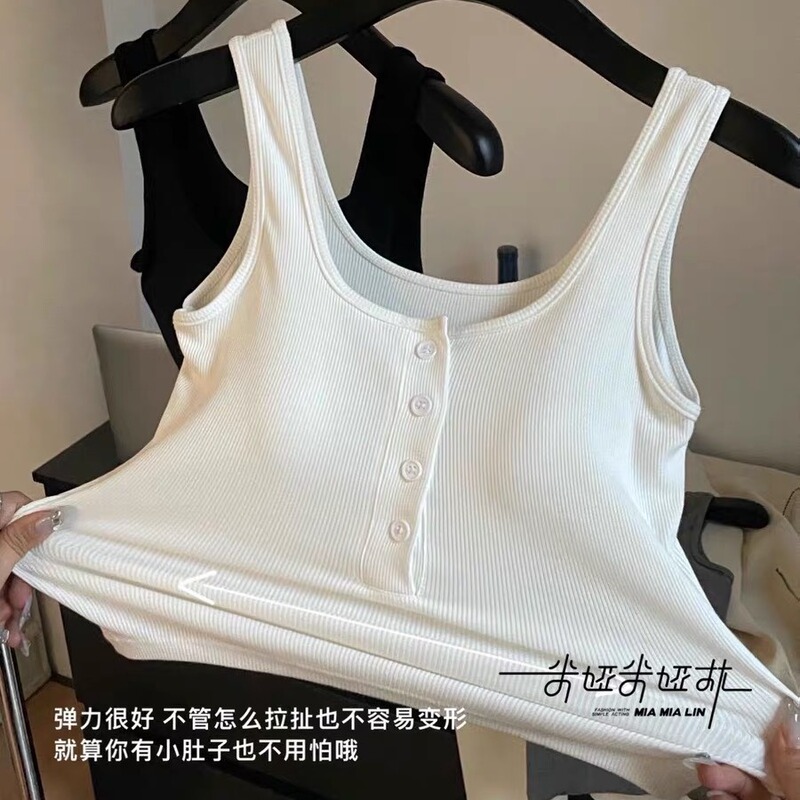 新商品は純綿のネジのボタンのベストを合わせます。|undefined